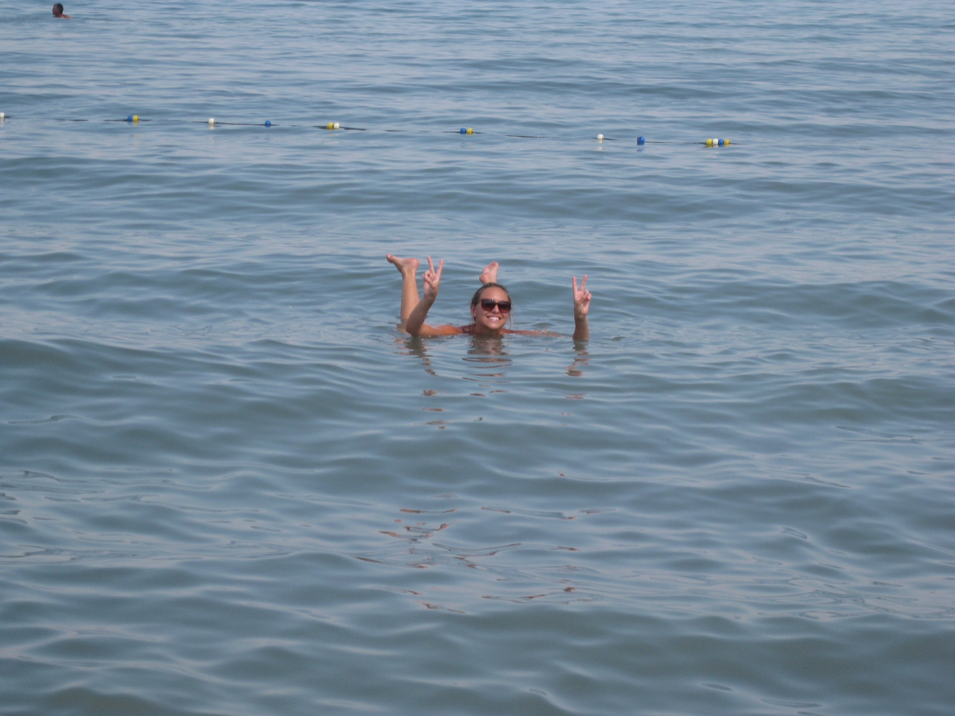 Kristi floating in Dead Sea