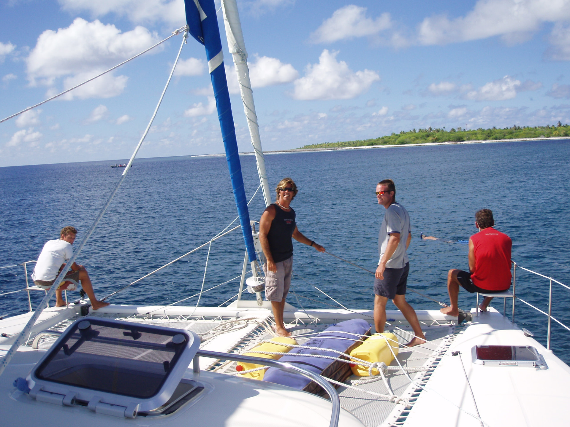 On deck, anchored off the motu, Tuamotus