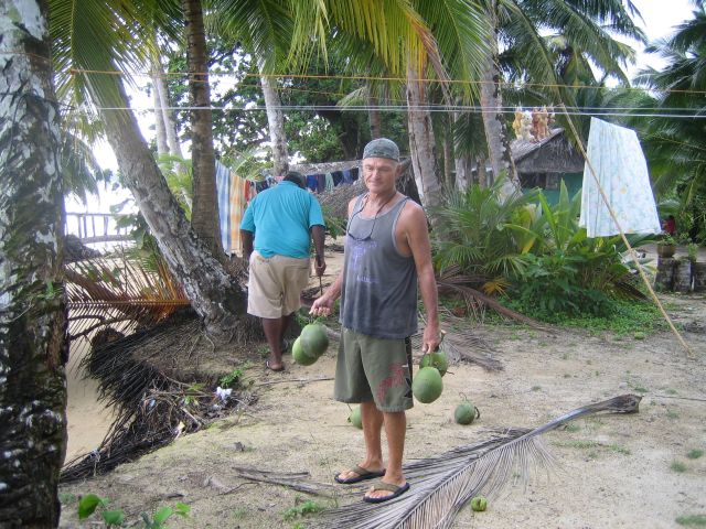 Dick gathering coconuts- Bastimentos, Panama