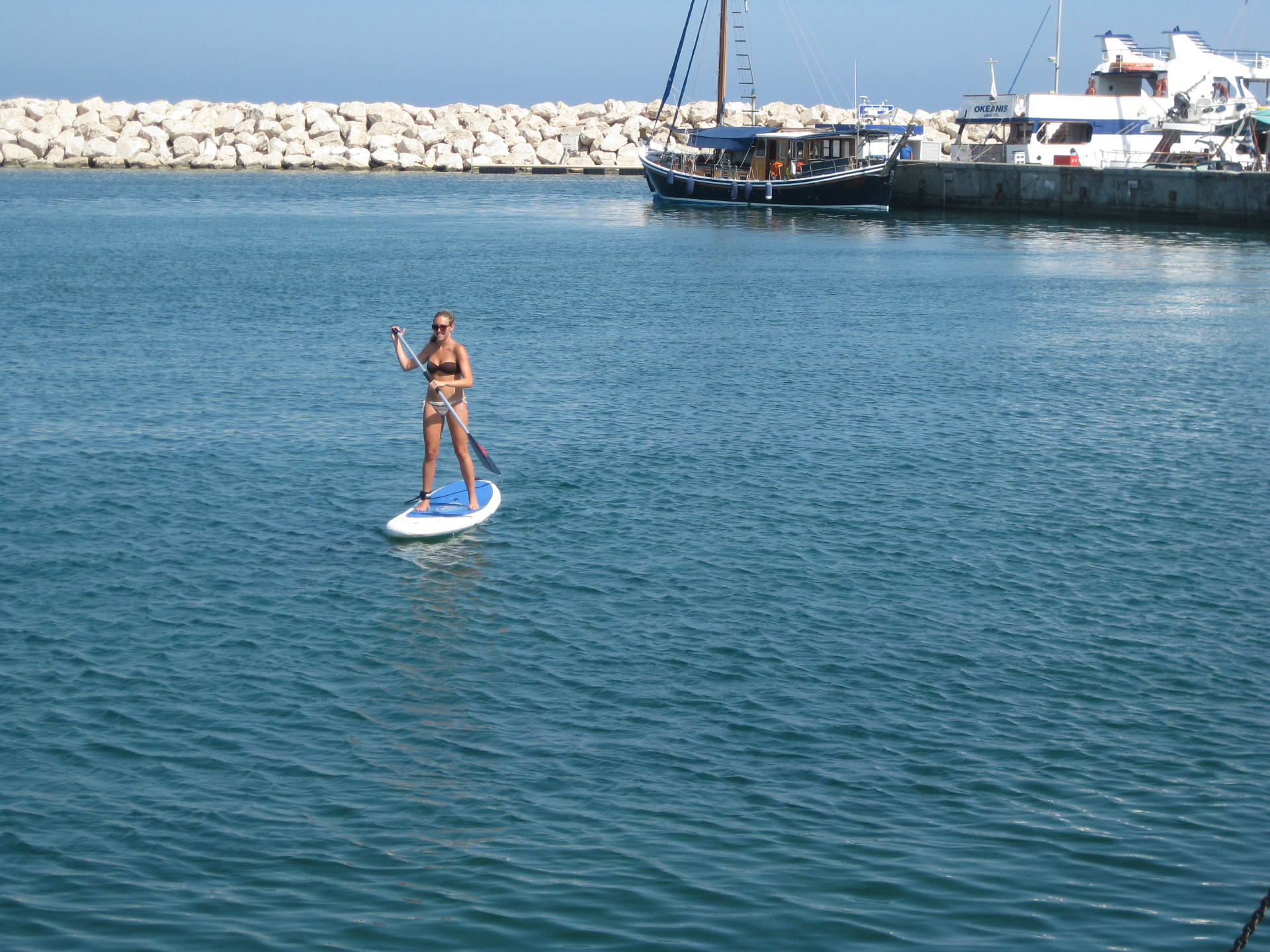 Paddleboarding in the harbor, Cyprus