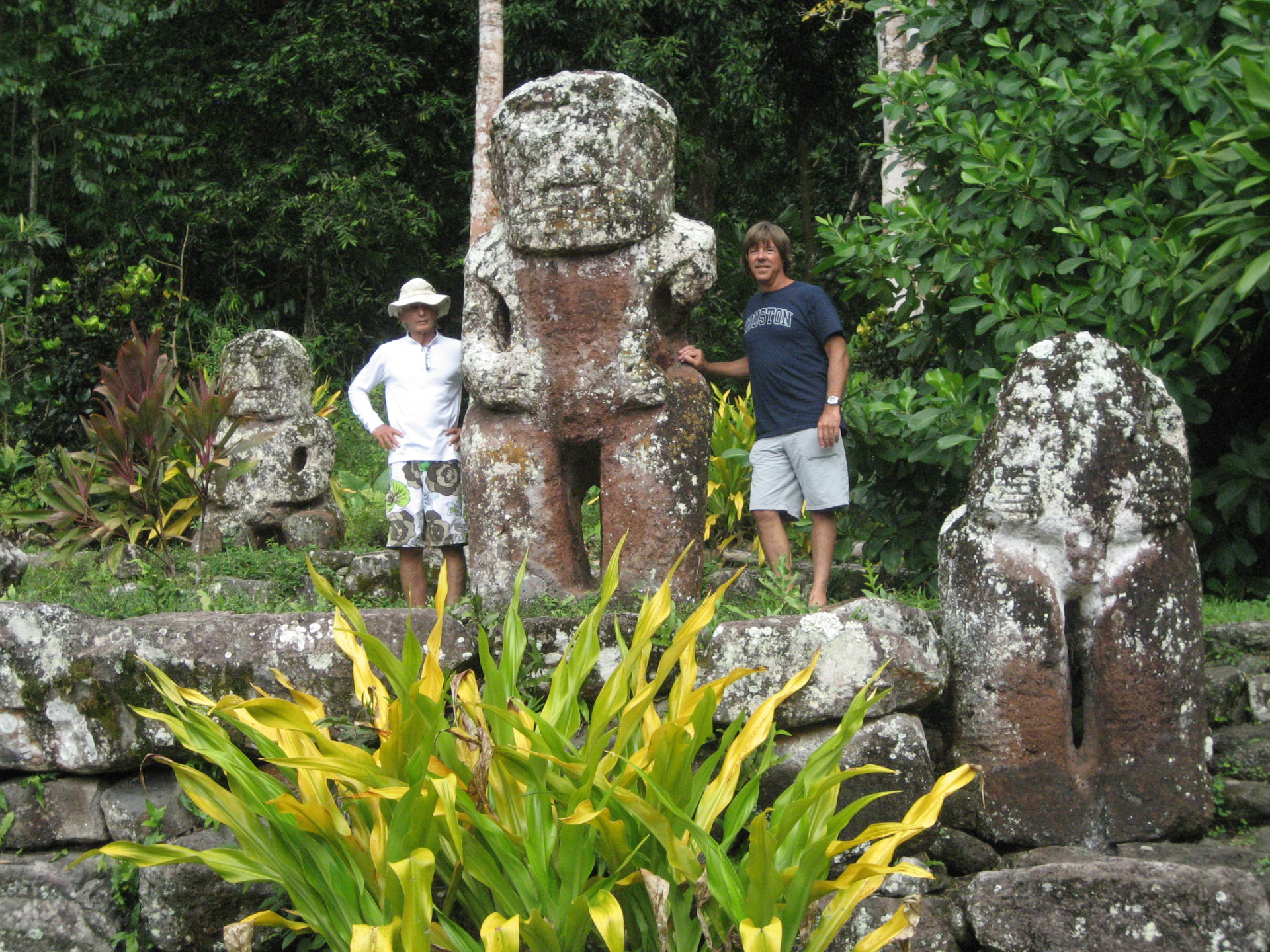 Russell with the ancient stone tikis, Marquesas Islands