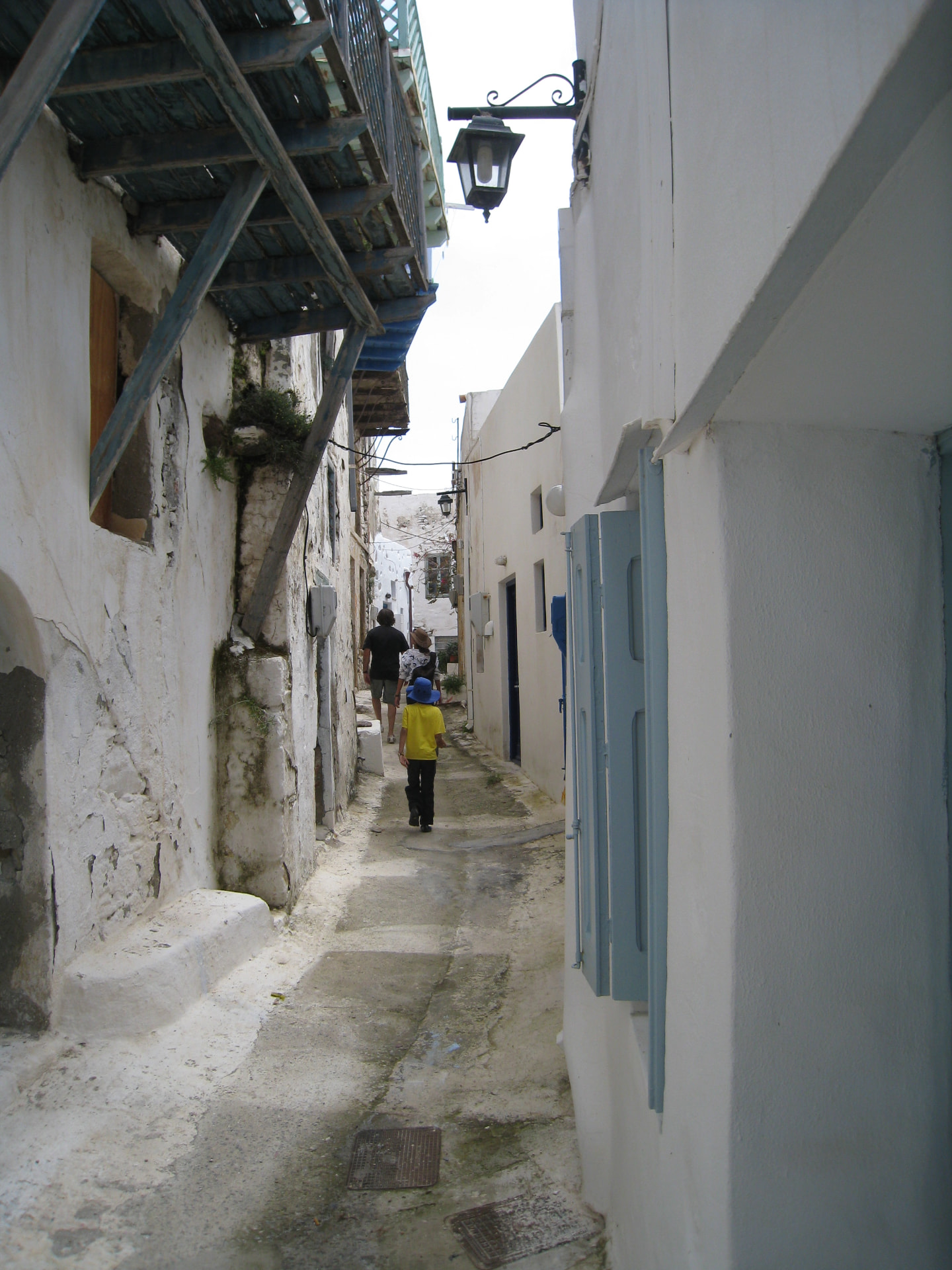 Exploring the narrow whitewashed lanes of a Greek village