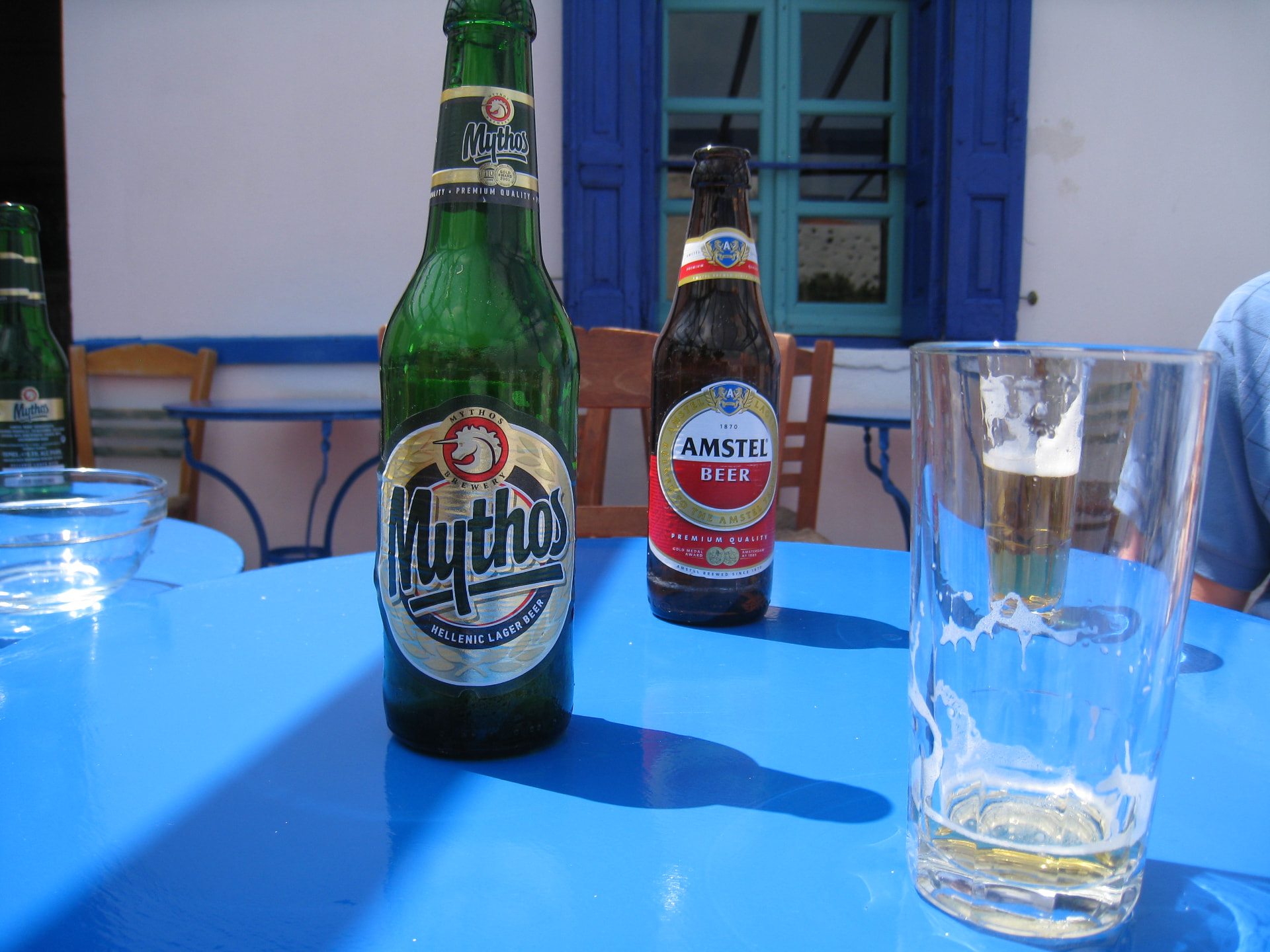 A cold beer at a taverna table in the Greek Islands