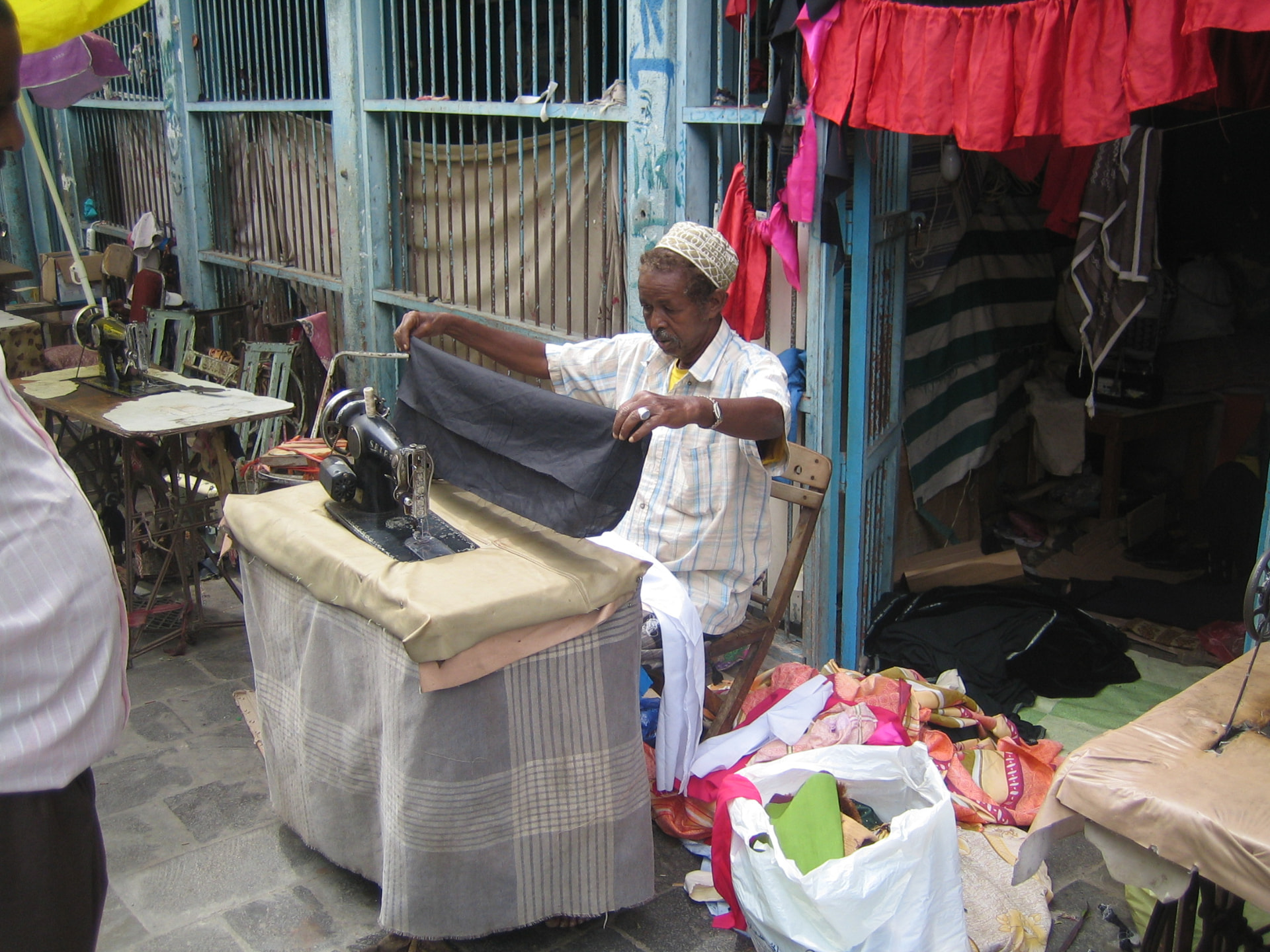 A tailor at work in Aden
