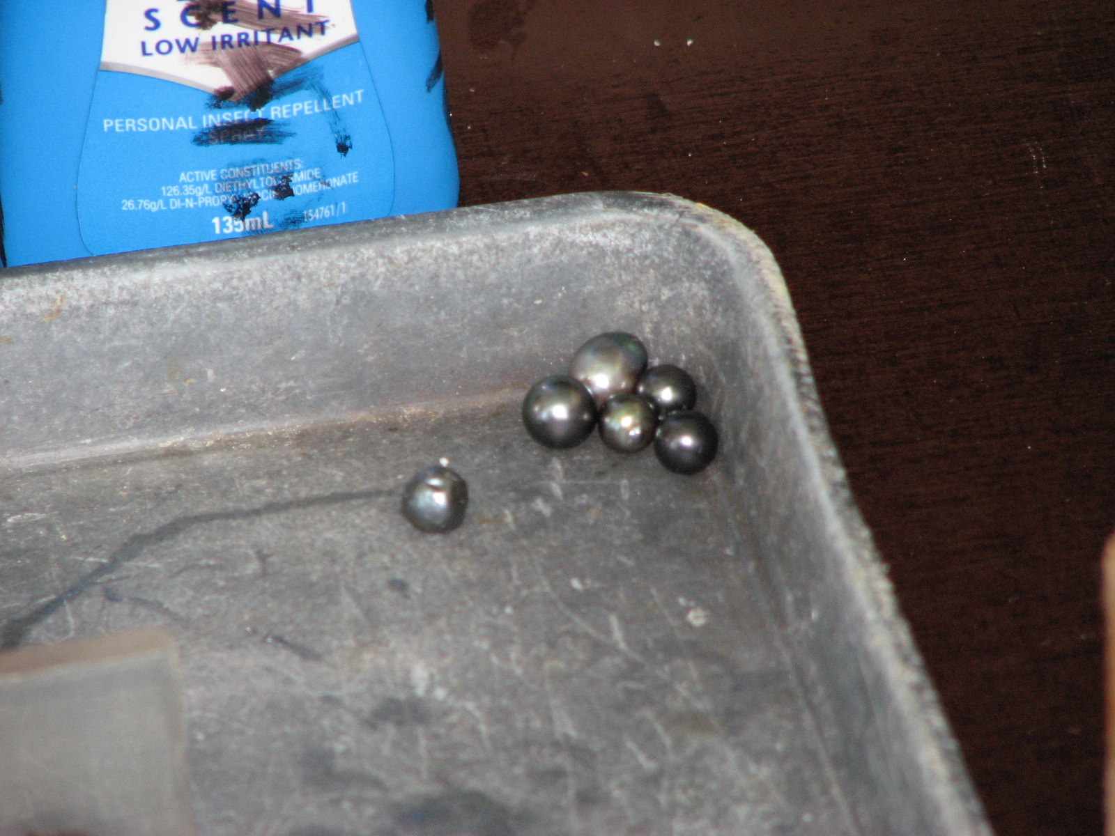 Freshly harvested black pearls