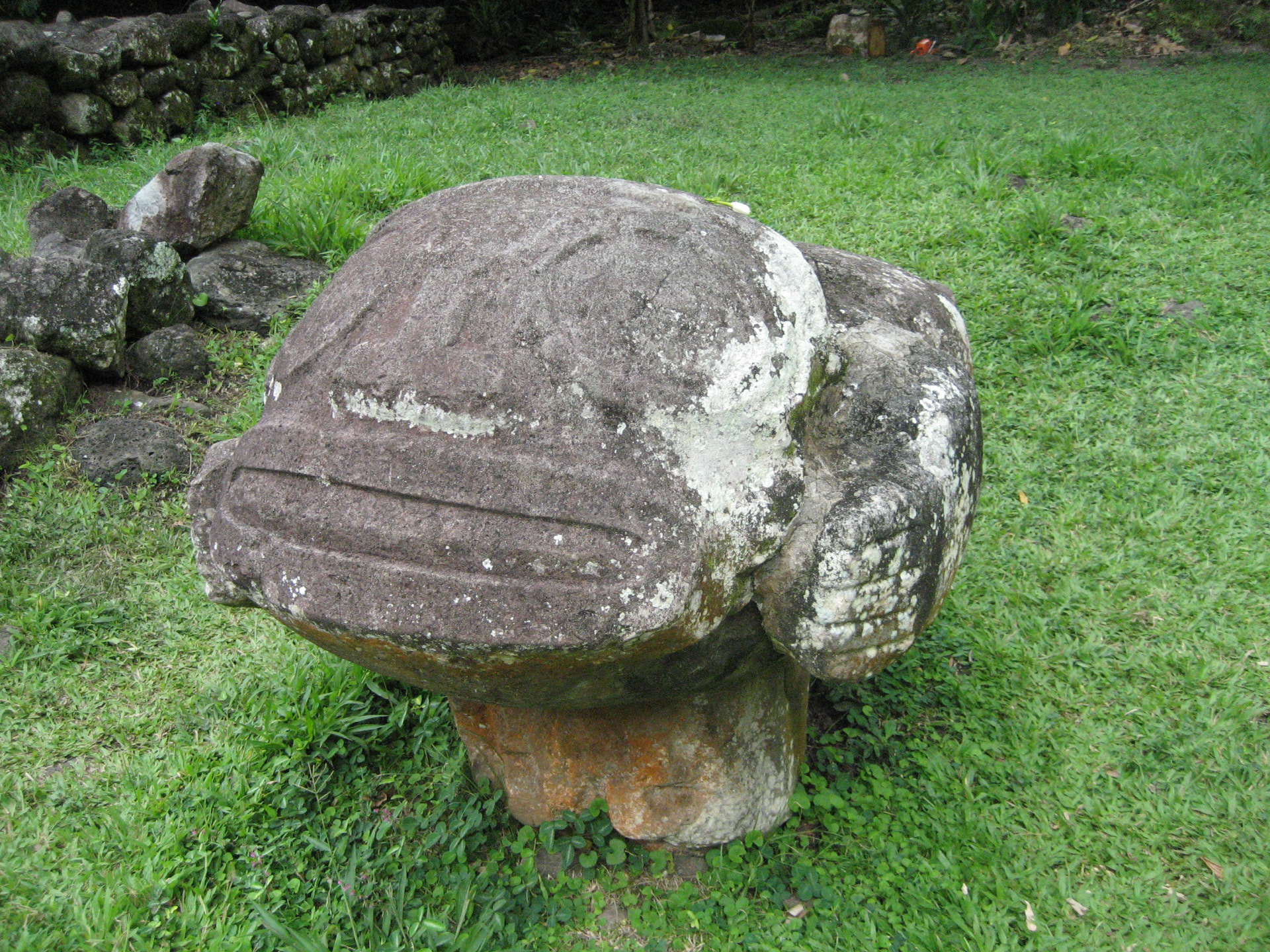 Carved stone tiki head, Marquesas Islands
